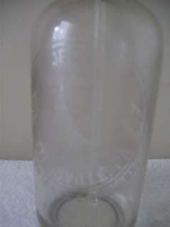 Clear Glass with etched Property of Streich Bottling Works Titusville 