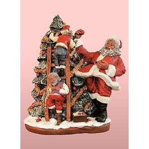   Trims The Tree   African American Santa Claus Figurine: Home & Kitchen