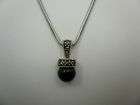 Sterling Silver Marcasite Onyx and MOP Purse Pendant  