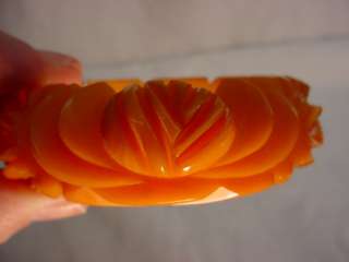 Hefty Vintage Carved Orange Bakelite Bangle  