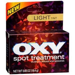  OXY SPOT TREATMENT LIGHT TINT .65oz by MENTHOLATUM COMPANY 